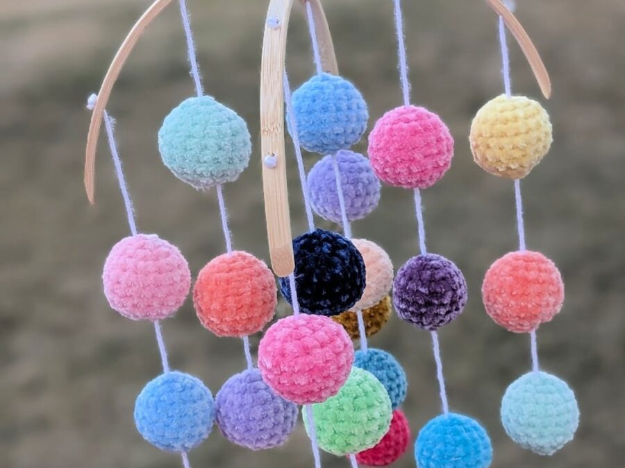 Colorful velvet rainbow crochet baby mobile with soft balls