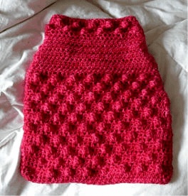 Berry stitch dog sweater laid flat